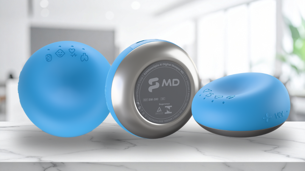 Dispositivo médico digital portátil na cor azul, com botões de controle e base metálica, usado para ausculta e monitoramento clínico.