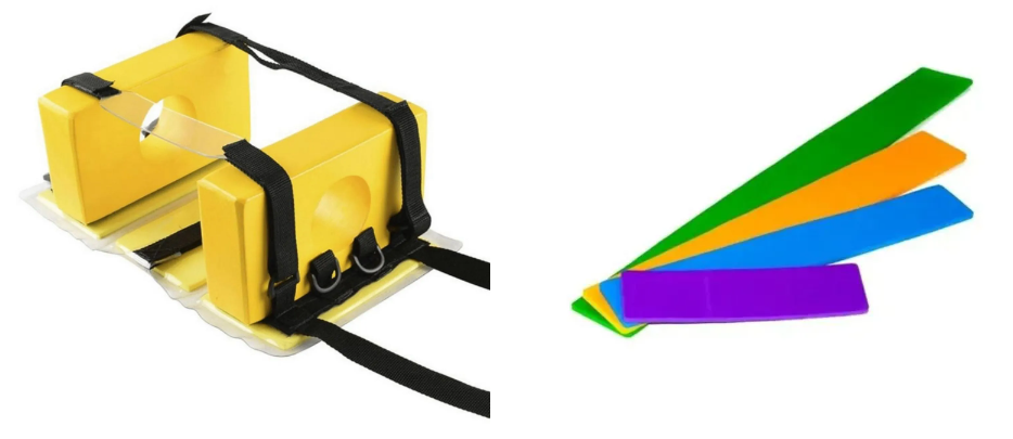 Imobilizador de cabeça para prancha de resgate e conjunto de talas de imobilização coloridas utilizadas no atendimento pré-hospitalar. Equipamentos essenciais para estabilização de membros e da coluna em situações de emergência e primeiros socorros.